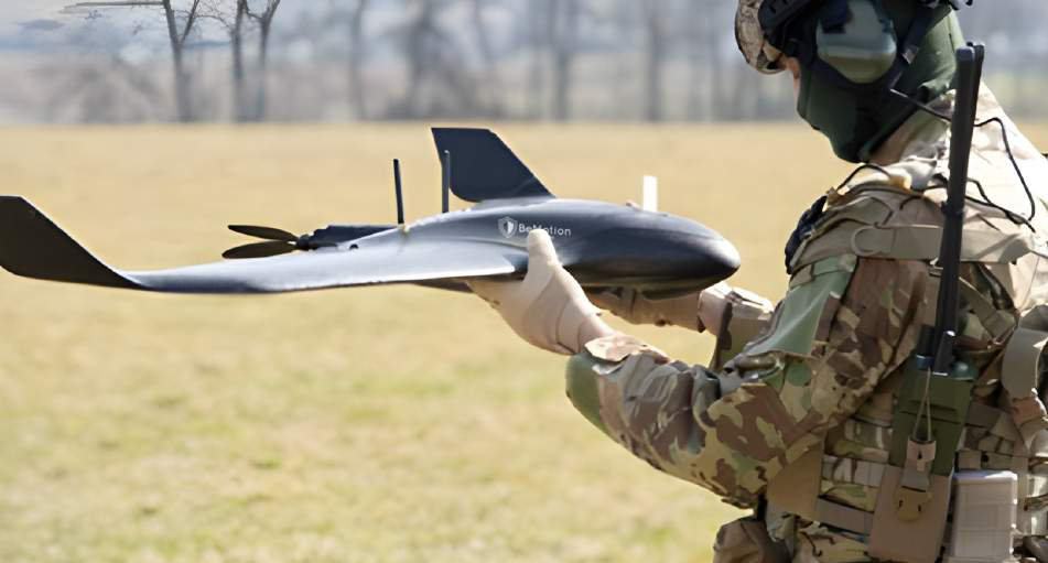 Operator hand-launching the OneSalute Vortex Vision