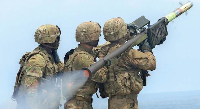 Soldiers with a shoulder-launched surface-to-air missile